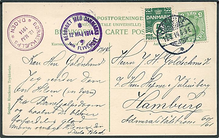 5 øre Bølgelinie og 5 øre Chr. X på brevkort stemplet Roskilde d. 12.5.1914 til Hamburg, Tyskland. Stemplet Besørget med Danmarks 1ste Flyvepost 12. Maj 1914 og Børnehjælpsdagen. Sjælden flyvningskort til udlandet.