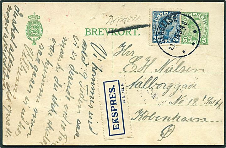 5 øre Chr. X helsagsbrevkort opfrankeret med 20 øre Chr. X og sendt som ekspres fra Slagelse d. 29.1.1918 til København. Hvid ekspres-etiket formular: 97.b 123 b. Små nålehuller.