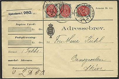 8 øre Tofarvet omv. ramme i par og single på 24 øre frankeret adressebrev for pakke fra Kjøbenhavn I d. 11.4.1900 til Skive.