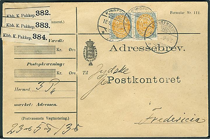 100 øre Tofarvet omv. rm. 7. tryk i par på adressebrev for tre pakker fra Kjøbenhavn d. 18.5.1903 til Fredericia.