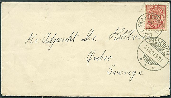 10 øre Våben på brev annulleret med lapidar Skanderborg d. 28.12.1892 via Fredericia til Örebro, Sverige.